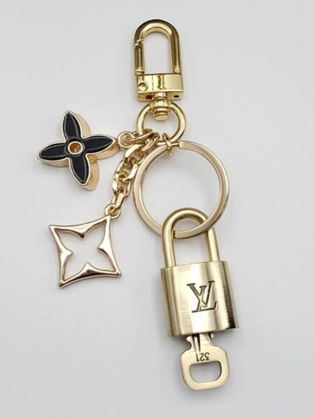 Louis Vuitton Gold Padlock Key 🔒 Authentic LV Charm + Unbranded Flower Keychain - Picture 2 of 8